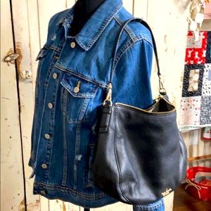 Kate Spade navy leather hand bag.